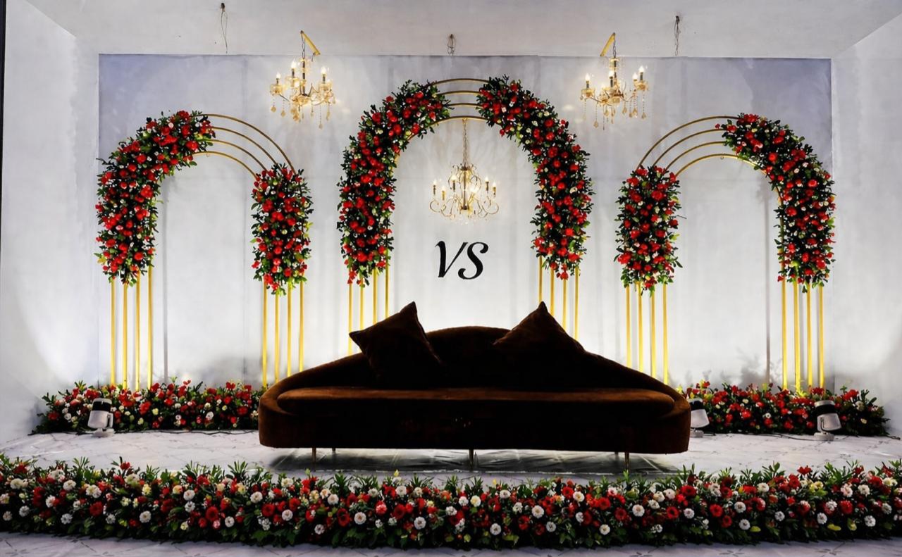 Wedding stage with floral arches